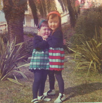 Me and my sister Sarah -- back when she was still taller than me and unafraid of public displays of affection.