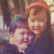 Me and my sister Sarah -- back when she was still taller than me and not against public displays of affection.